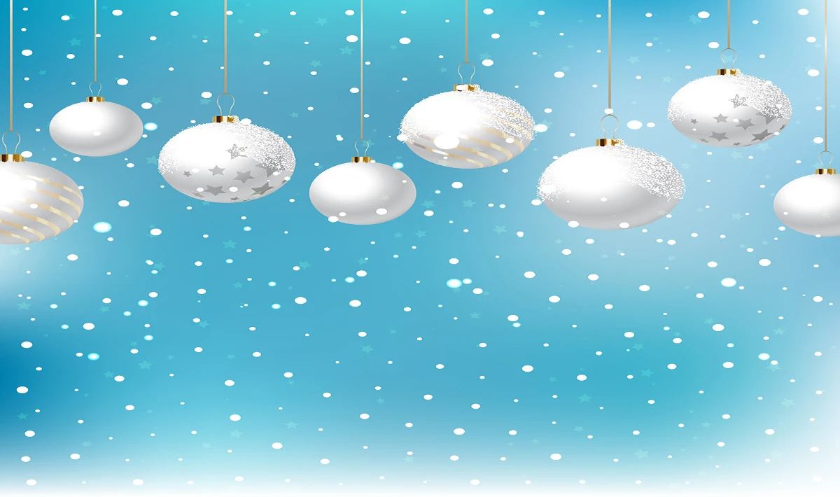 Soft white snowball decor hanging in office bays to create a lively mood