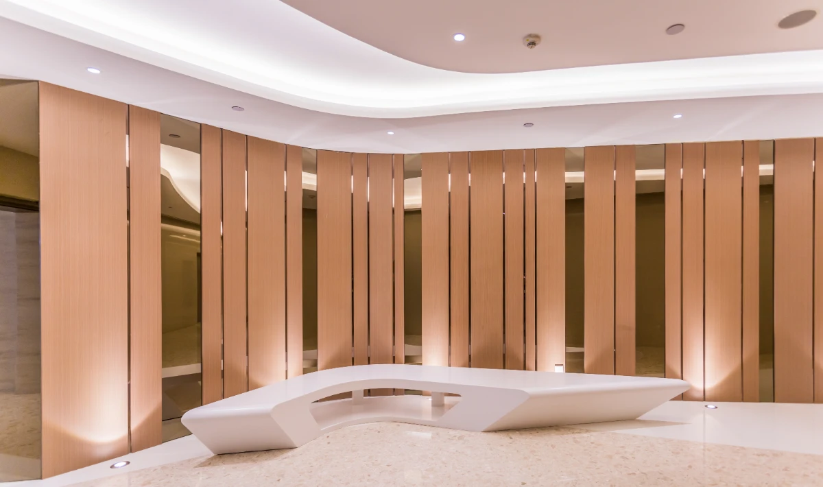  Layered gypsum ceiling panels creating depth in office interiors