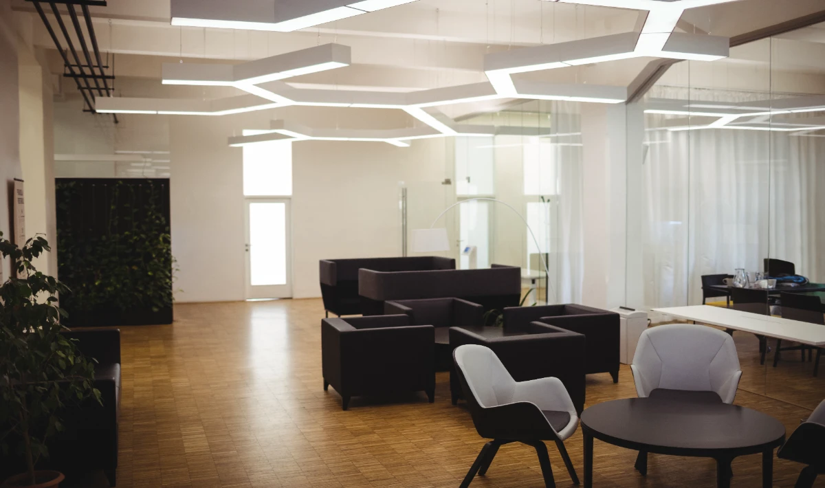 Adjustable lighting tracks fitted into gypsum ceiling system