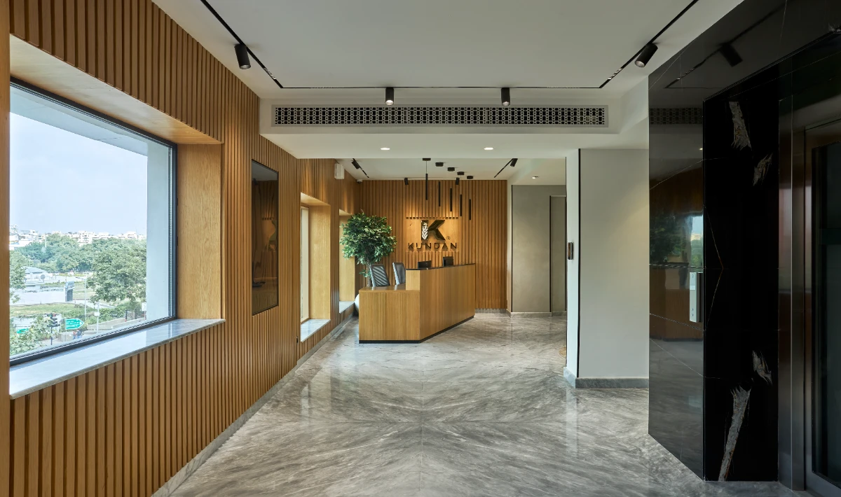 Wooden office wall design featuring brand logos and identity elements