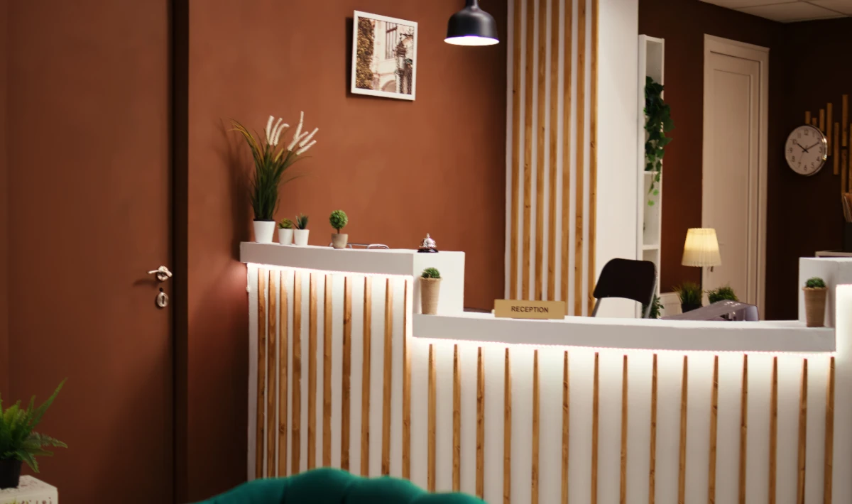 Compact reception desk designed for the small office room layout