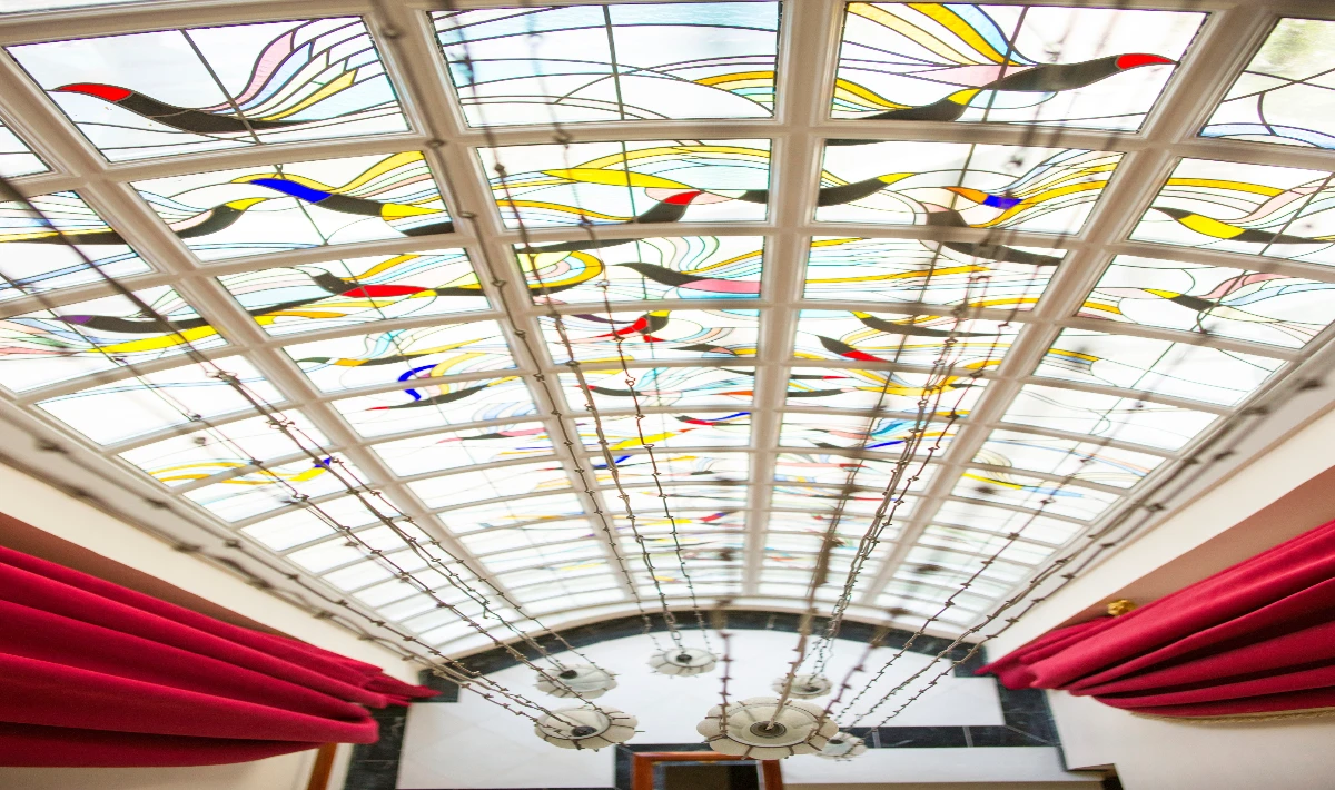 Custom mural office ceiling design with murals showcasing creative office artwork.