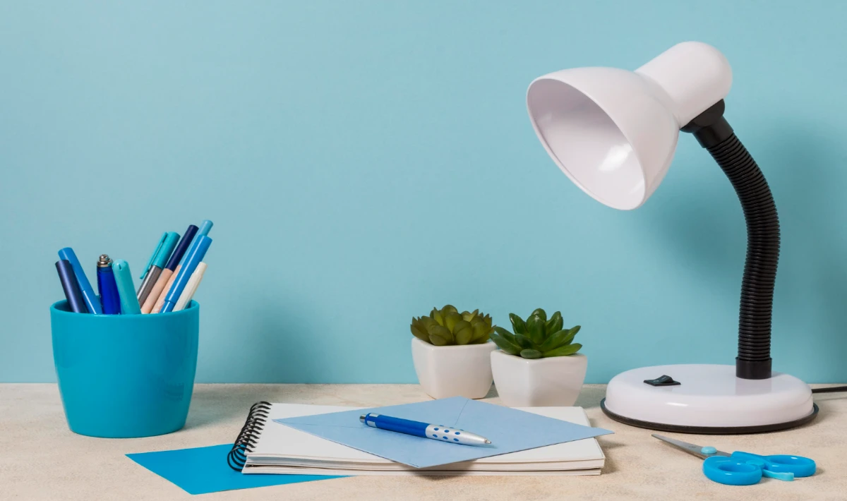 Stylish desk lamp giving soft light for a warm and focused workspace