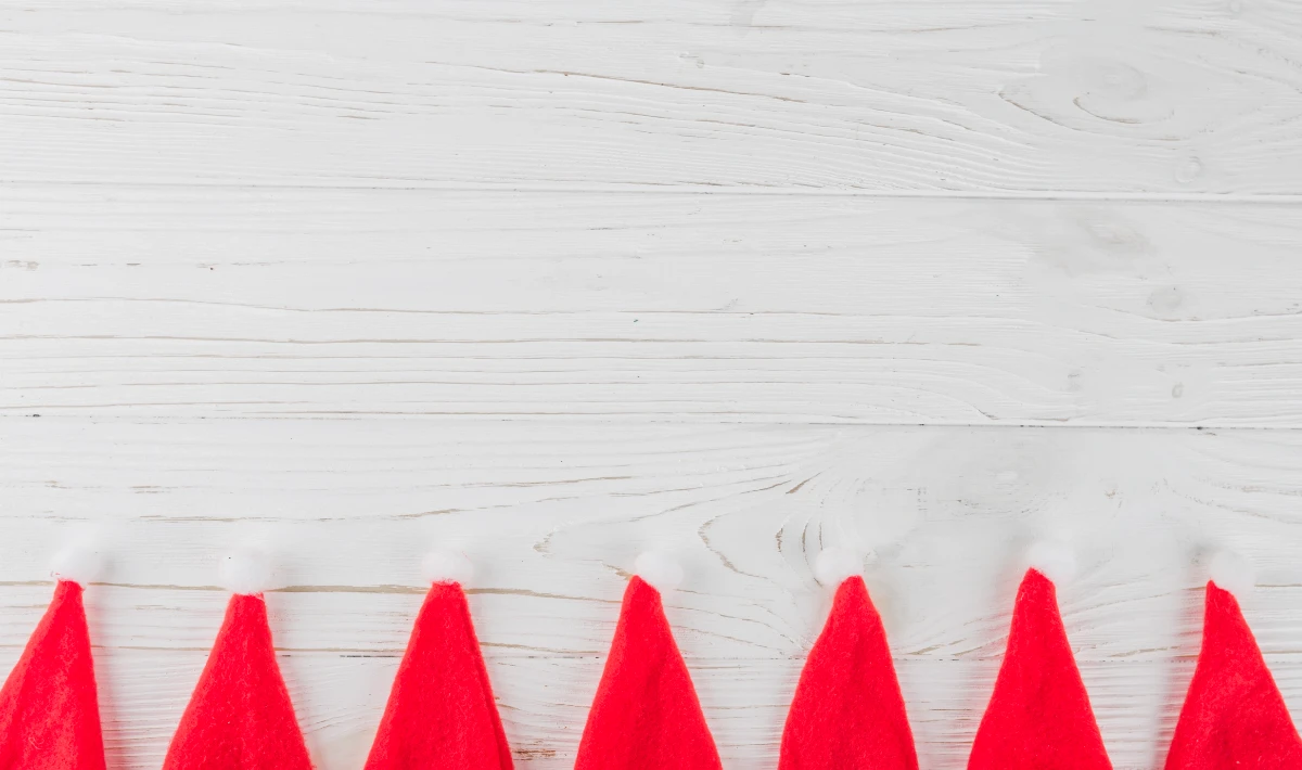 Red and white festive desk flags placed on office workstations for colour