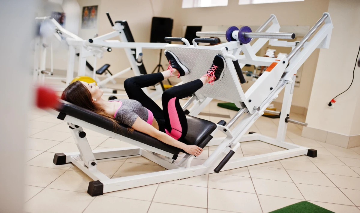 Compact gym equipment arranged strategically in small office spaces
