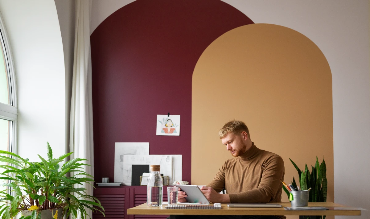 Deep burgundy and beige office colours create a warm feeling