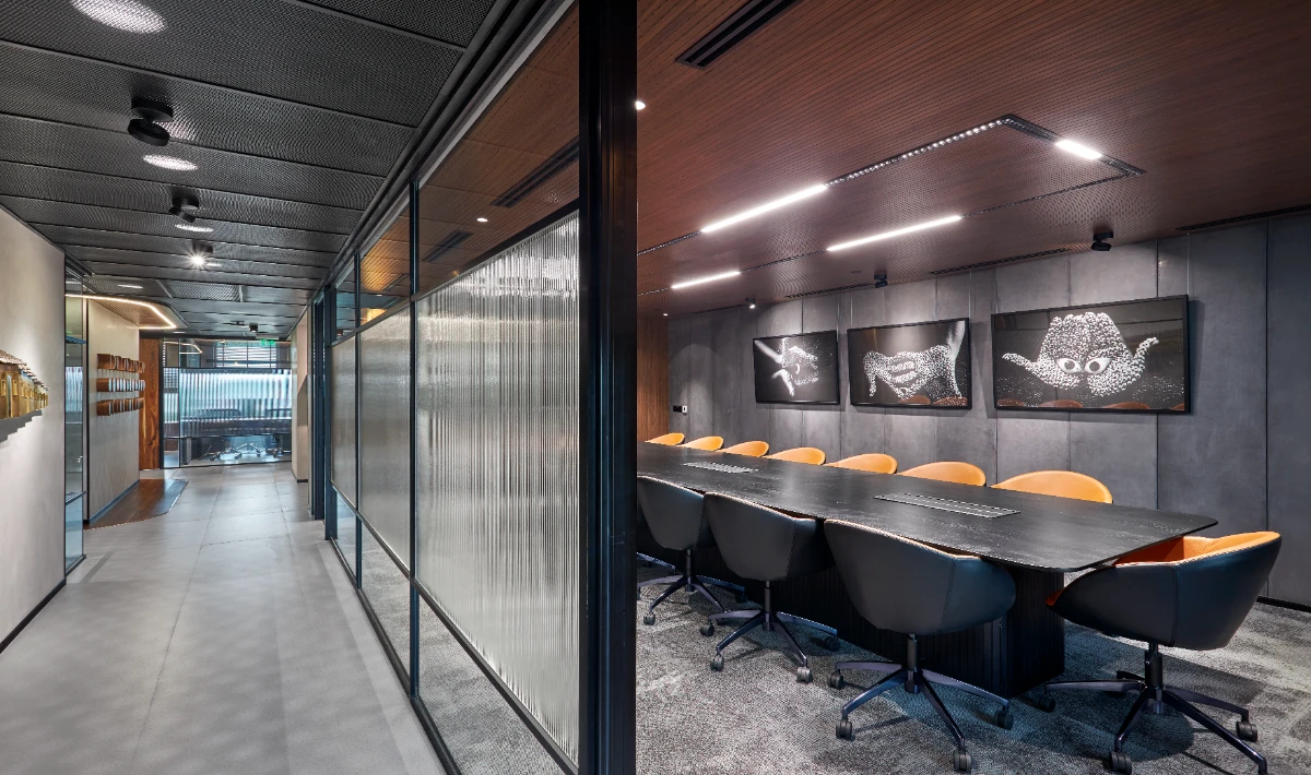 Smart glass partition wall inside a modern office meeting room