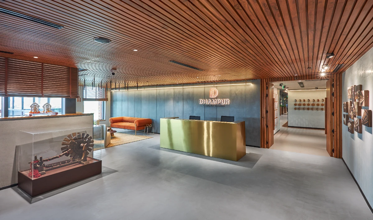 Classic wooden office interior layout with desks and organised storage units