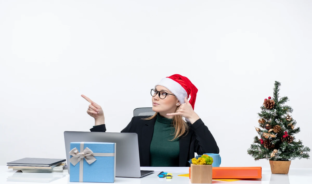 Green festive garland placed on office walls for a warm Christmas feel