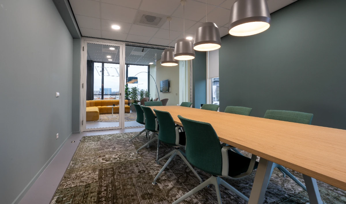Matte neutral office wall tiles reducing glare in meeting spaces up