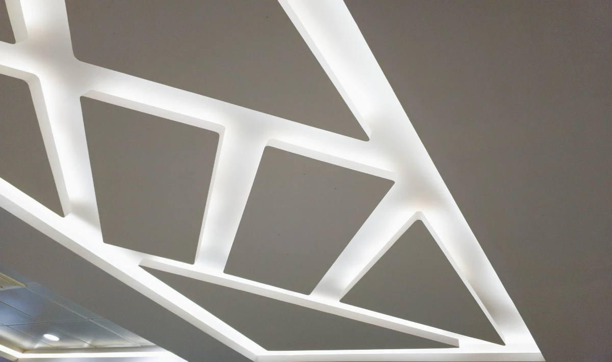 Highlighted gypsum ceiling borders framing office spaces