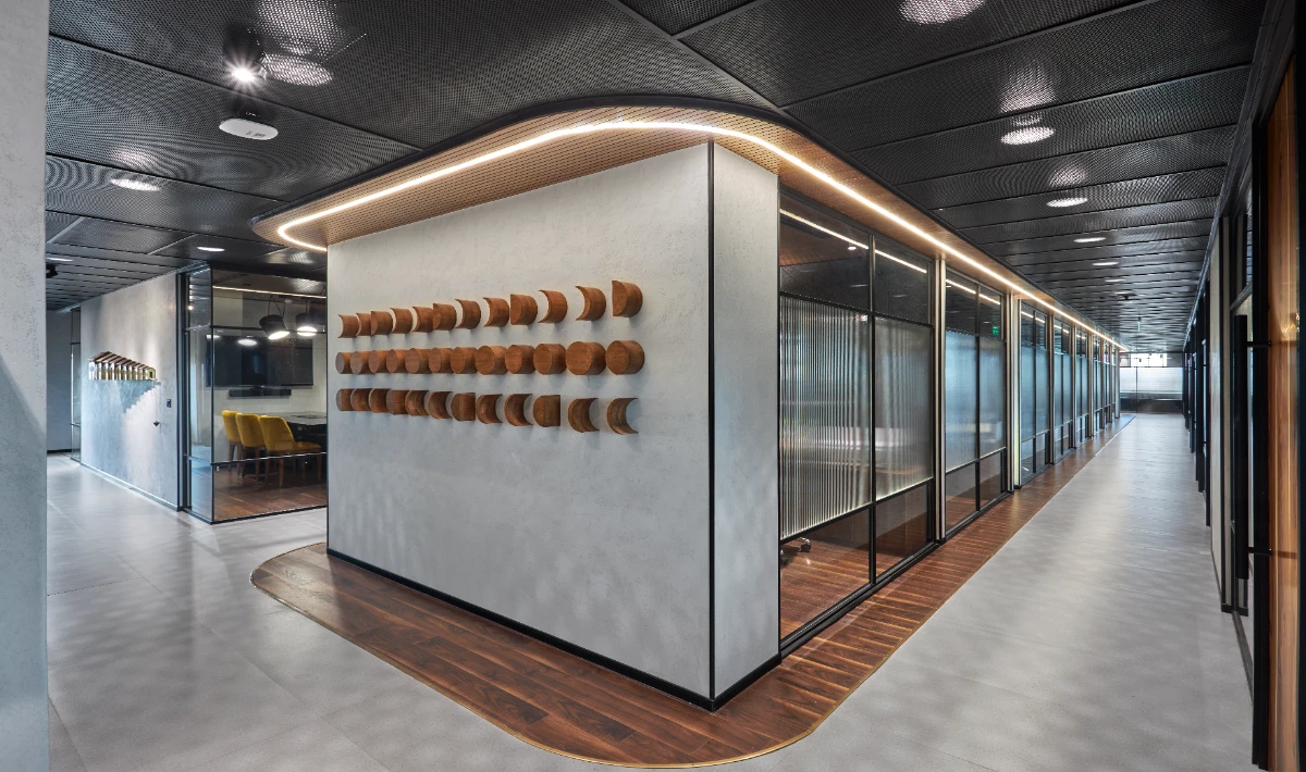 Sustainable recycled material wall design for a healthy workspace