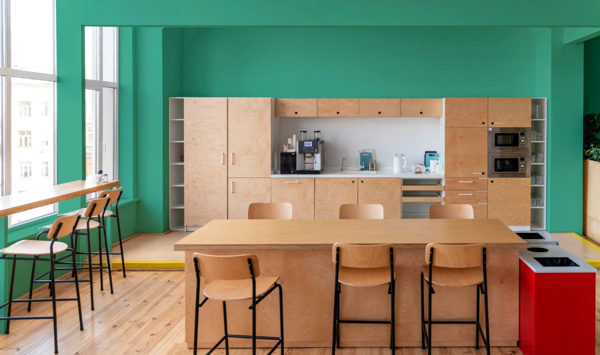 Sustainable office pantry with eco-friendly finishes and appliances