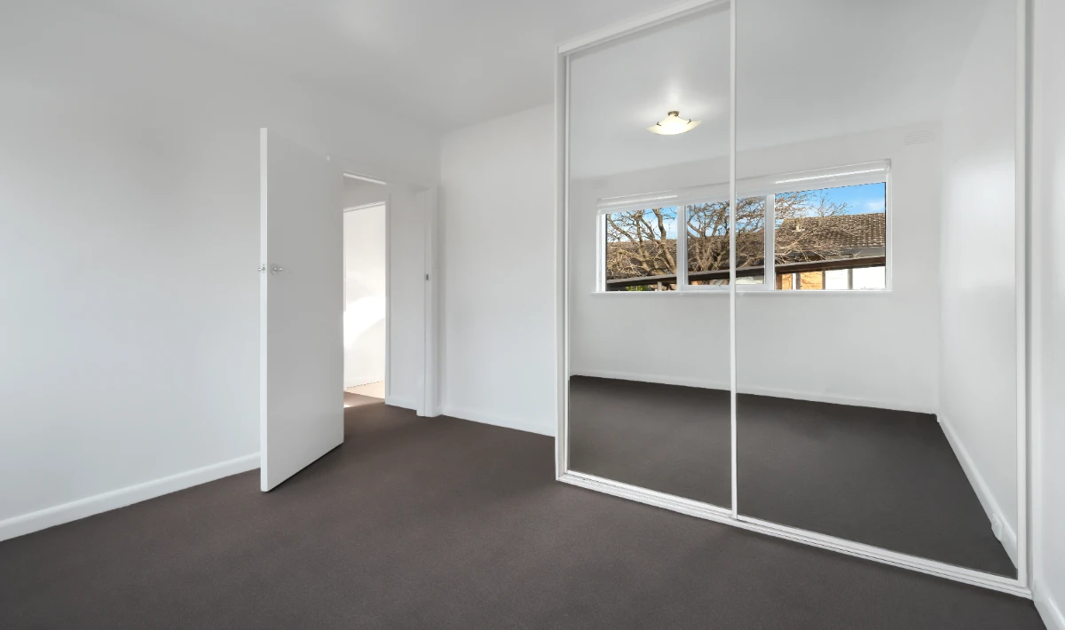Mirror placement enhances depth in office room interior design layout
