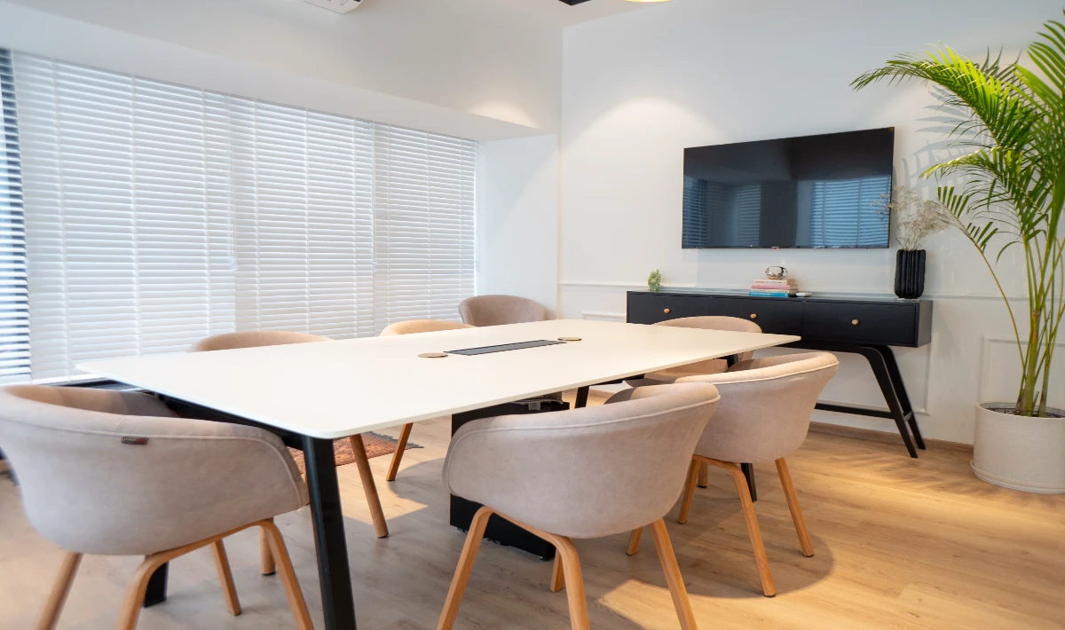 Ergonomic office setup with chairs and adjustable desks