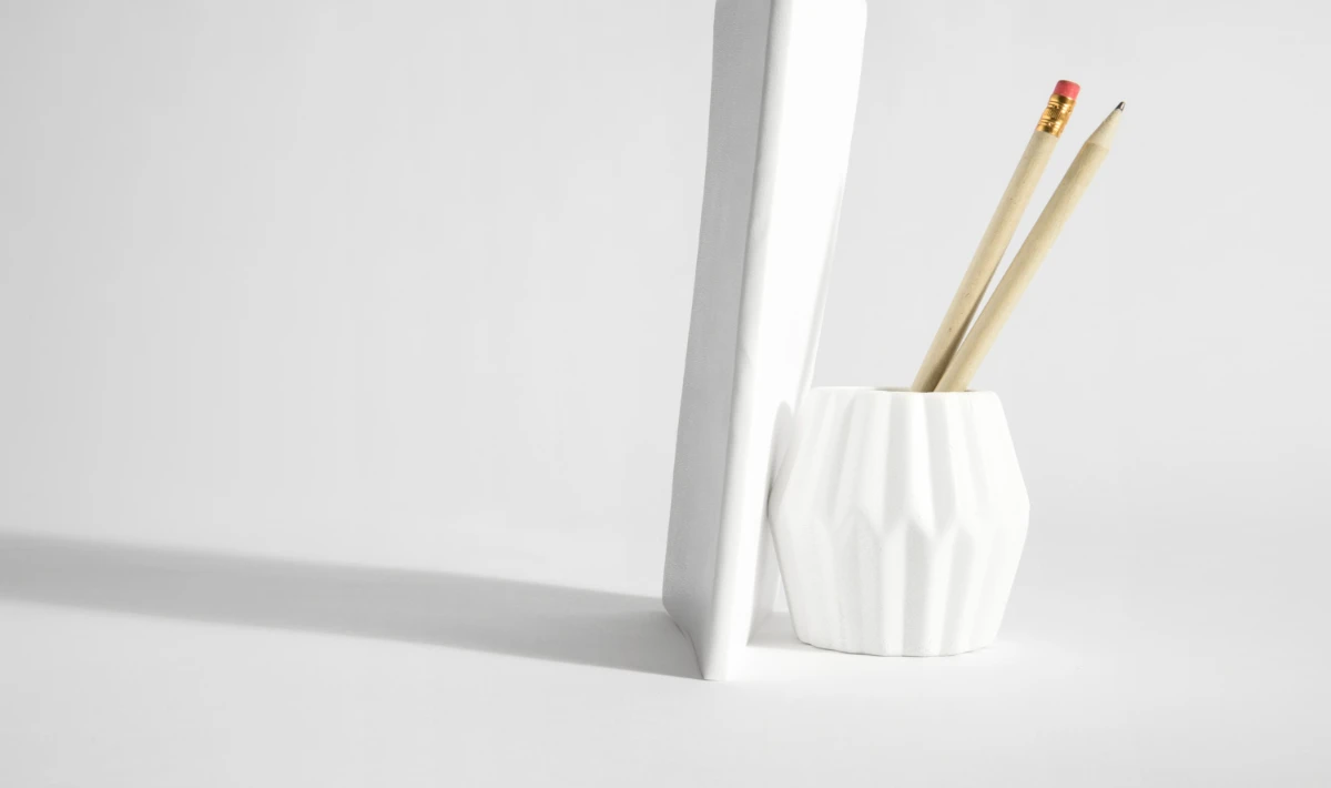 Minimal pen holder placed on a clean office desk for neat organisation
