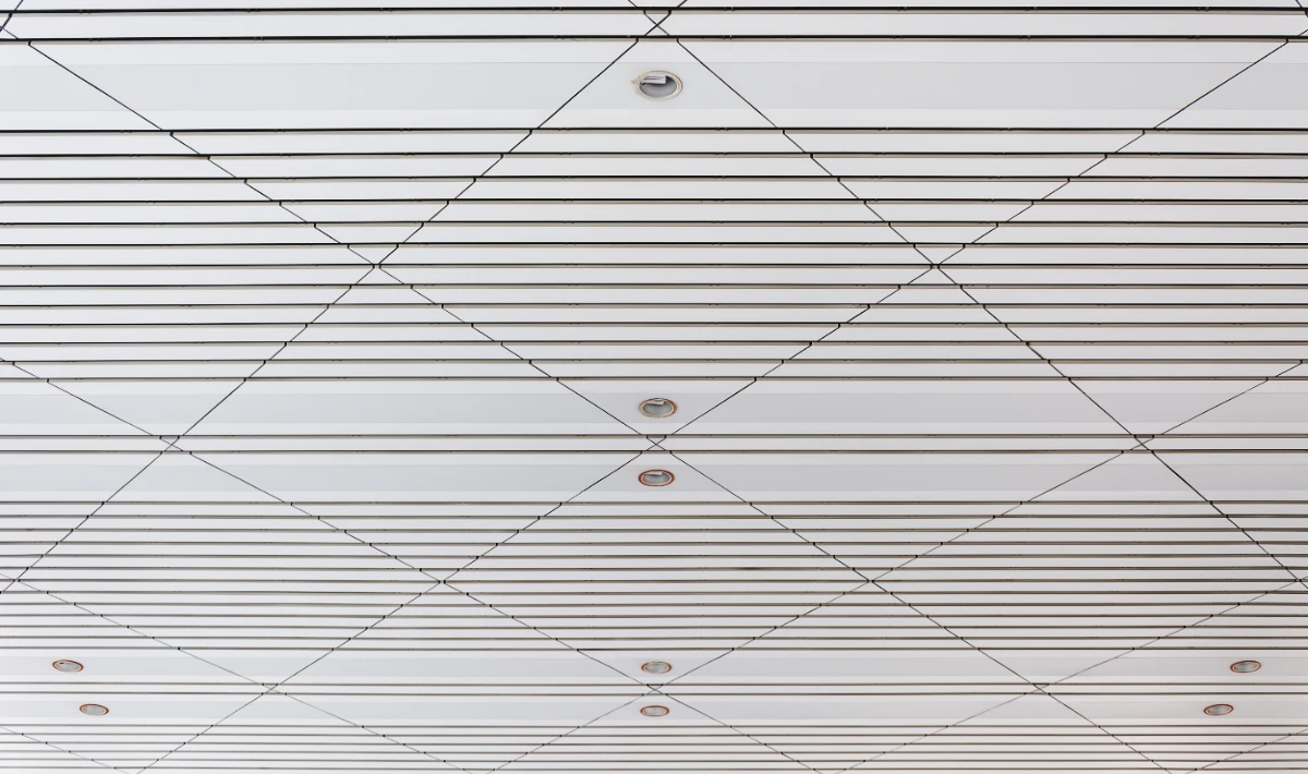 Grid-patterned gypsum board ceiling design for offices