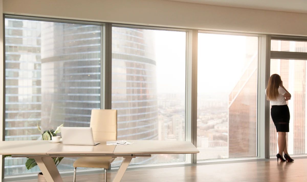 Frosted film partitions adding subtle privacy to glass office spaces